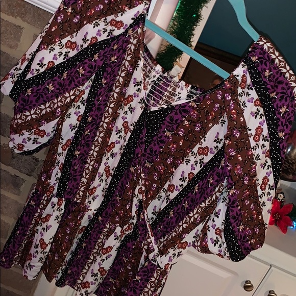 Tops - NWT Beautiful peplum blouse with ballon sleeves